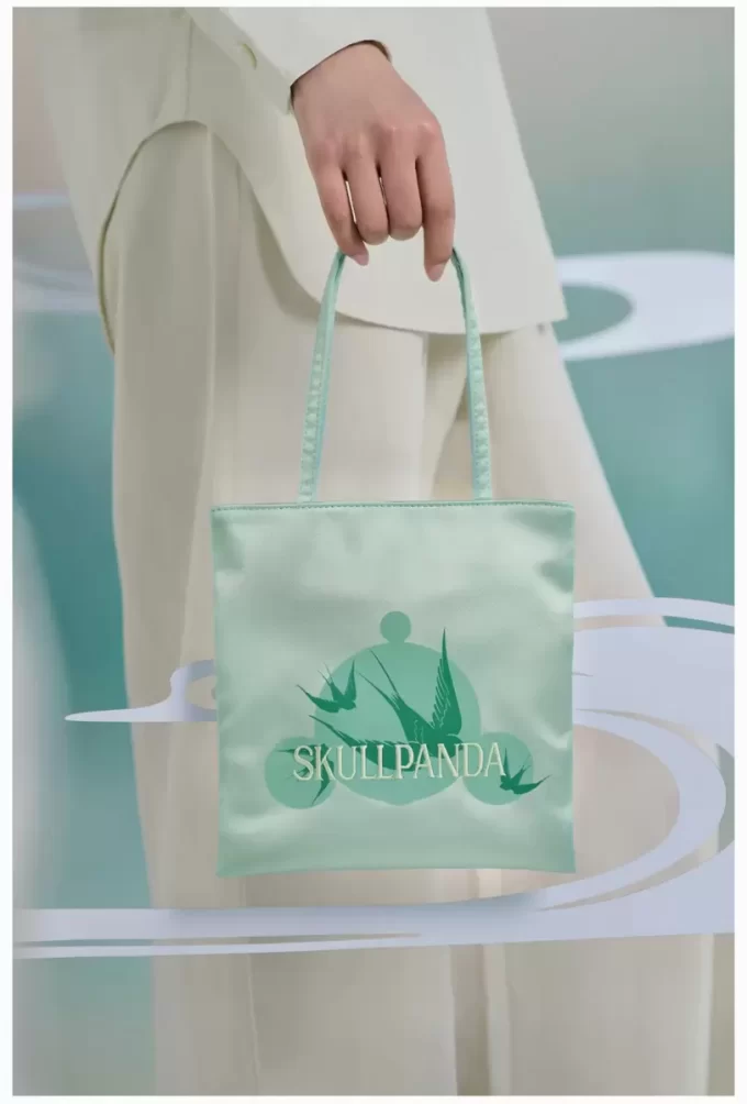 Borsa a mano della serie Mirage di SKULLPANDA