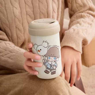 Serie calda e soffice per le feste – Tazza sottovuoto DIMOO