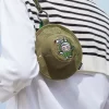 SERIE I MOSTRI CADONO NELLA NATURA SELVAGGIA – Mini borsa con cappello a secchiello e scatola portaoggetti SERIE I MOSTRI CADONO NELLA NATURA SELVAGGIA – Mini borsa con cappello a secchiello e scatola portaoggetti