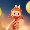 THE MONSTERS Let’s Have Fun Together Series – Custodia per auricolari a forma di tamburo sonaglio