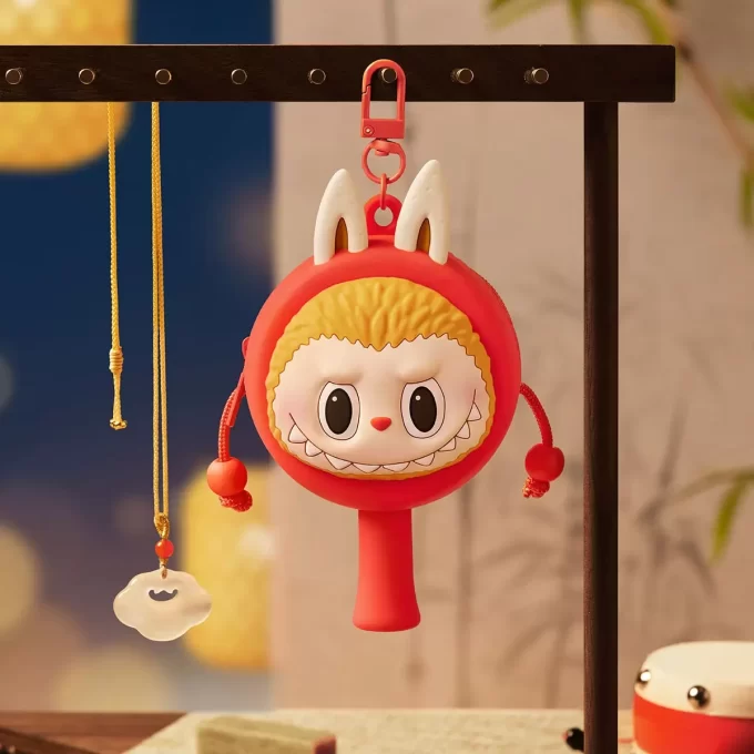 THE MONSTERS Let’s Have Fun Together Series – Custodia per auricolari a forma di tamburo sonaglio